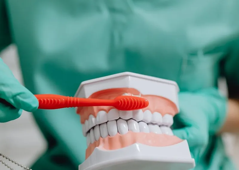 Dental team preparing instruments for a final fitting appointment