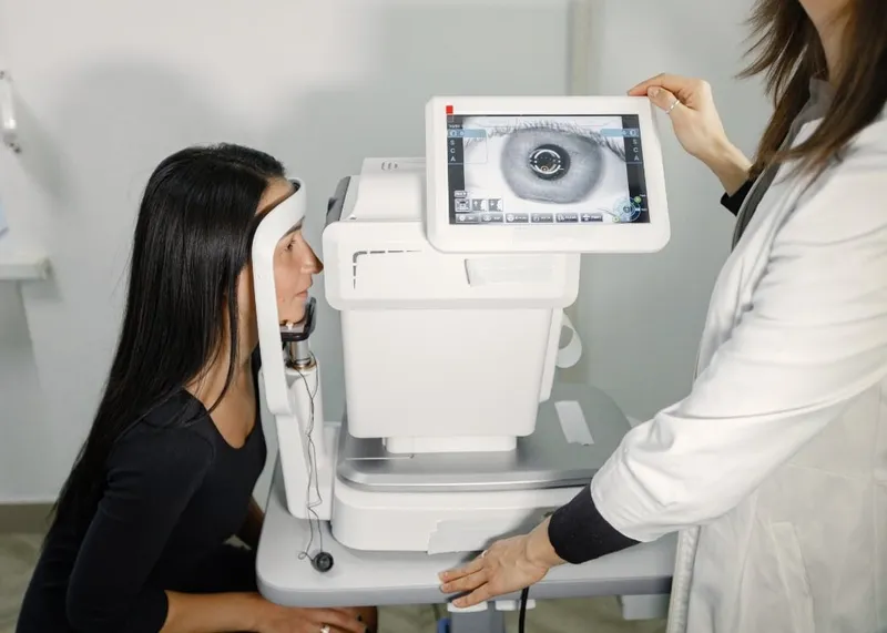 Patient coordinator reviewing a written eye treatment quote at an Istanbul clinic