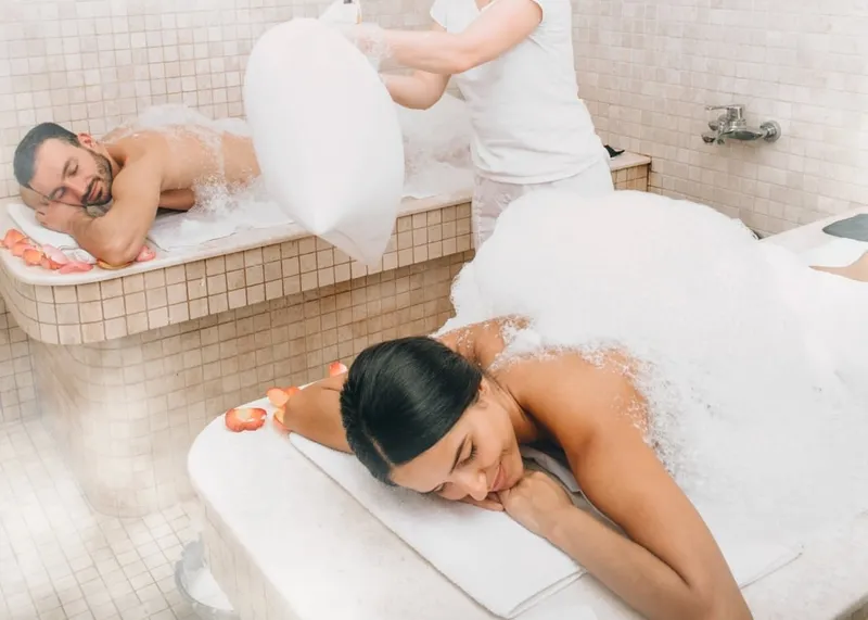 Private hammam suite with side-by-side treatment beds for couples at an Istanbul spa